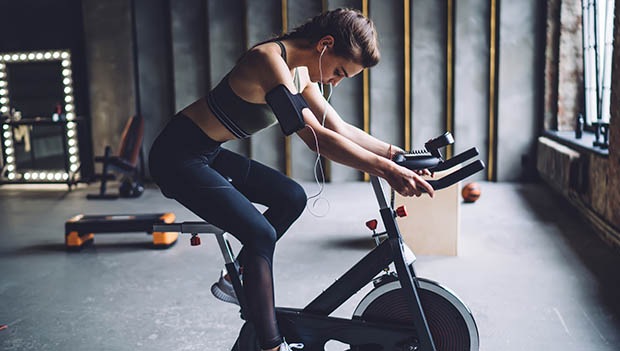 Riding a hot sale stationary bike